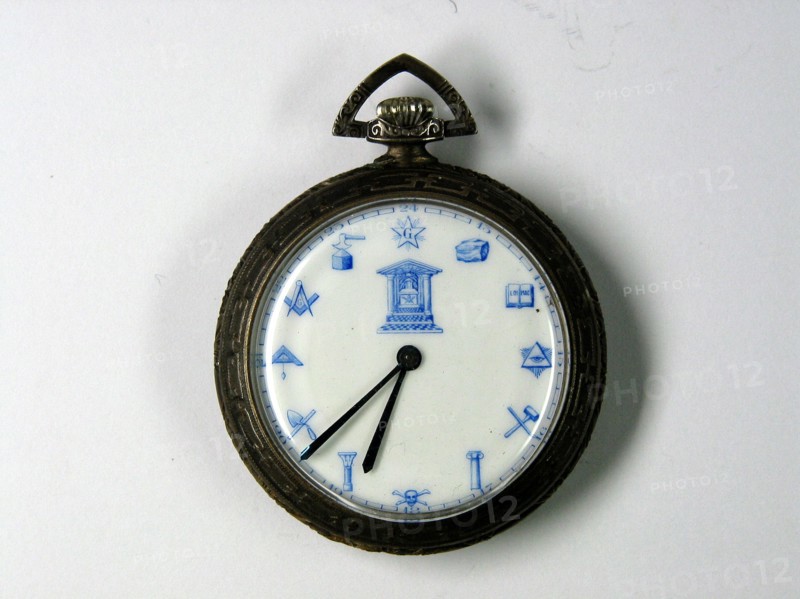 Pécou, Enamelled Comtoise clock face with Masonic motifs.