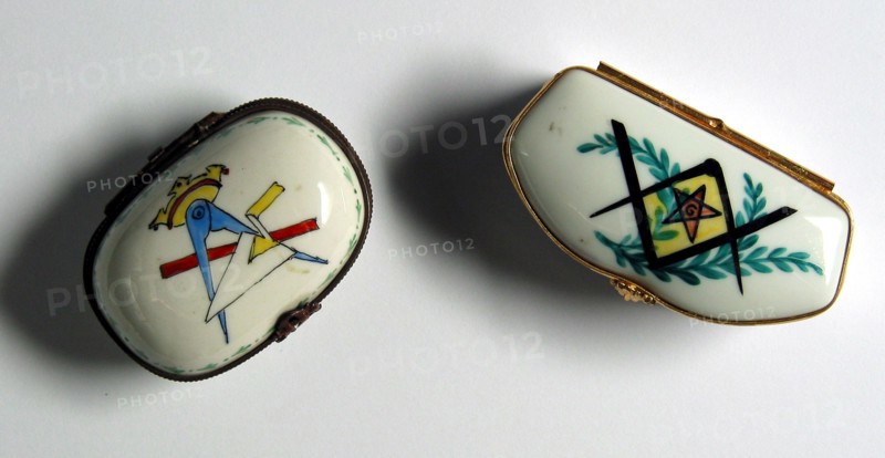 Porcelain pillboxes with Masonic motifs.