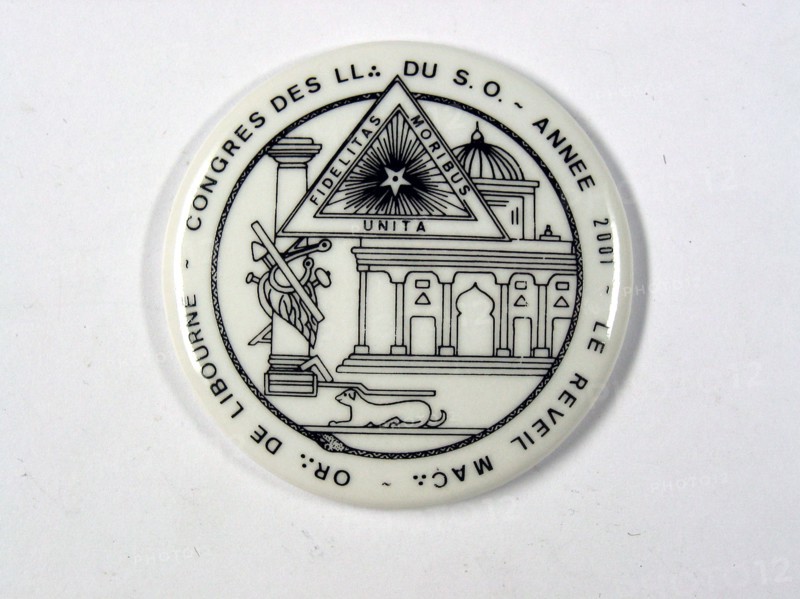 Porcelain token with Masonic decoration.