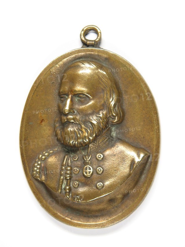 Oval medallion bearing the portrait of Giuseppe Garibaldi.
