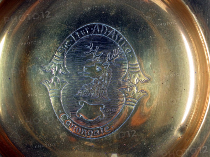 Central motif of a brass dish.