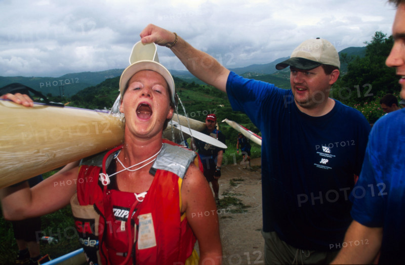 girl in shock as water poured down her backfrom jug