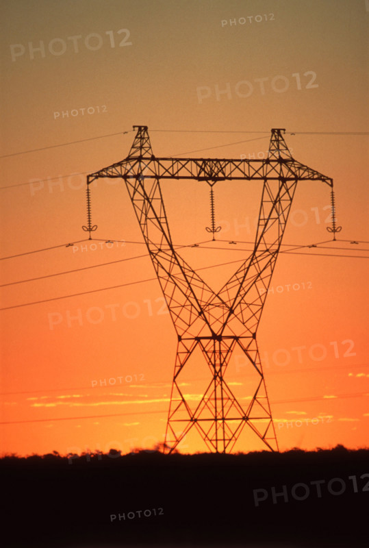 Electicity pylon at sunset