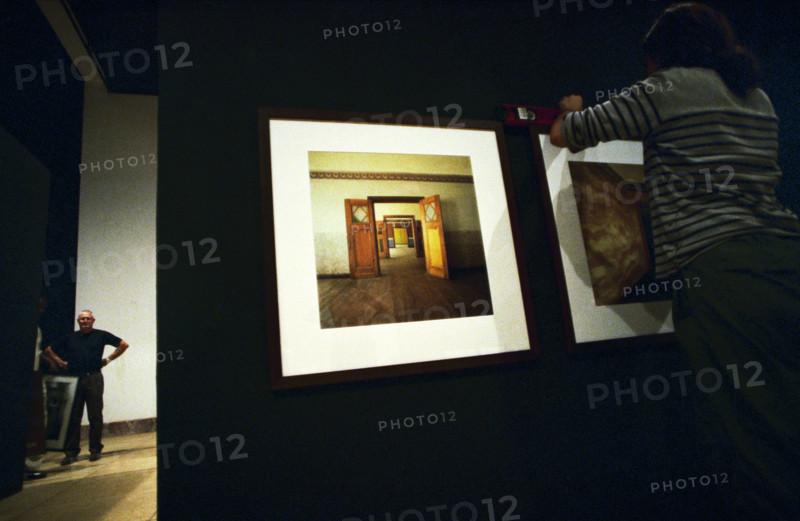 Setting up photographic exhibition at the National Museum before the launch of the 6th African Encounters of Photography, Bamako, Mali, November 2005