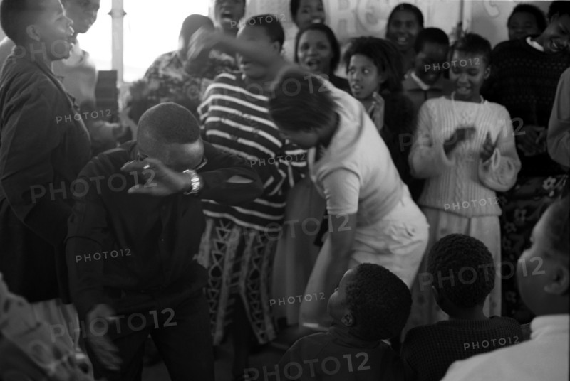 Celebration service for the opening of a new church in Hopewell, Pietermaritzburg, South Africa
9/1999
dancing, praising, worship, praise, dance, sing, singing, african, christianity, christians, christian, churches, services, religion