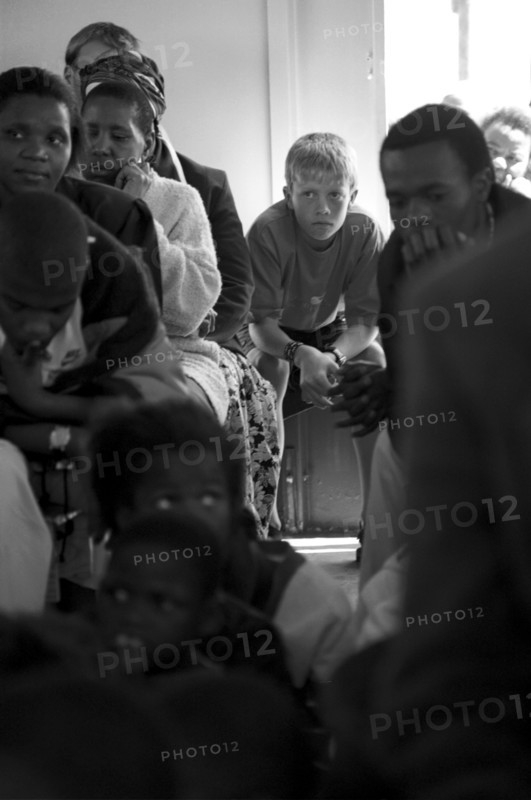 Celebration service for the opening of a new church in Hopewell, Pietermaritzburg, South Africa
9/1999
african, christianity, christians, christian, churches, services, religion, multiracial, multi cultural, white boy, township, non-racial, mixed