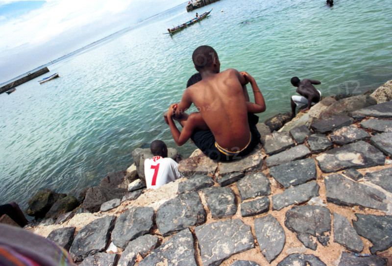 9/2003 Ile de Goree off Dakar, Senegal

sea, boats, water, boat, black couple, rocks, quey, ocean, love, harbour, harbours, island, islands