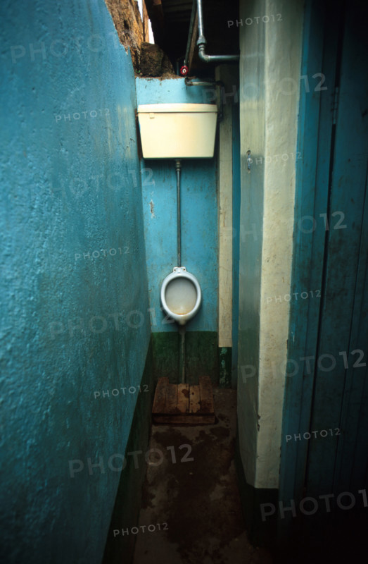 The urinal in the toilets at the Fariri Cafe in Isiolo, where we stopped for Andazi, a doughy triangular food. As we ate CNN was playing in the background - news about the recession in Germany