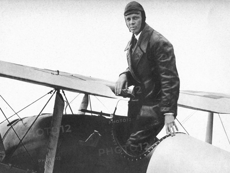 Charles Lindbergh standing by 'Spirit of St Louis'