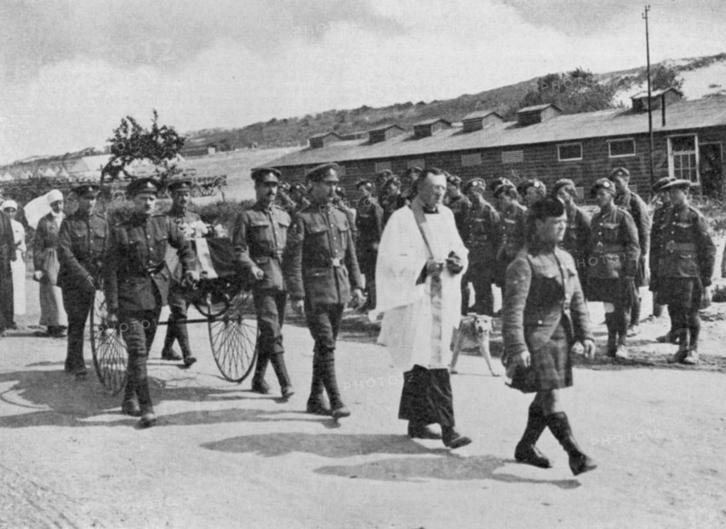 World War I: Army chaplain officiating at funeral of nurse killed during air raid on British base
