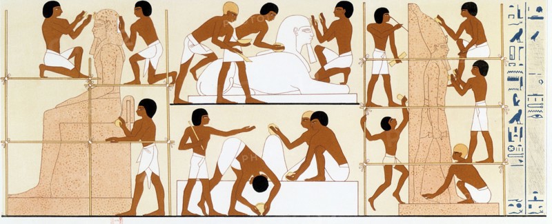 Sculptors working on a statue