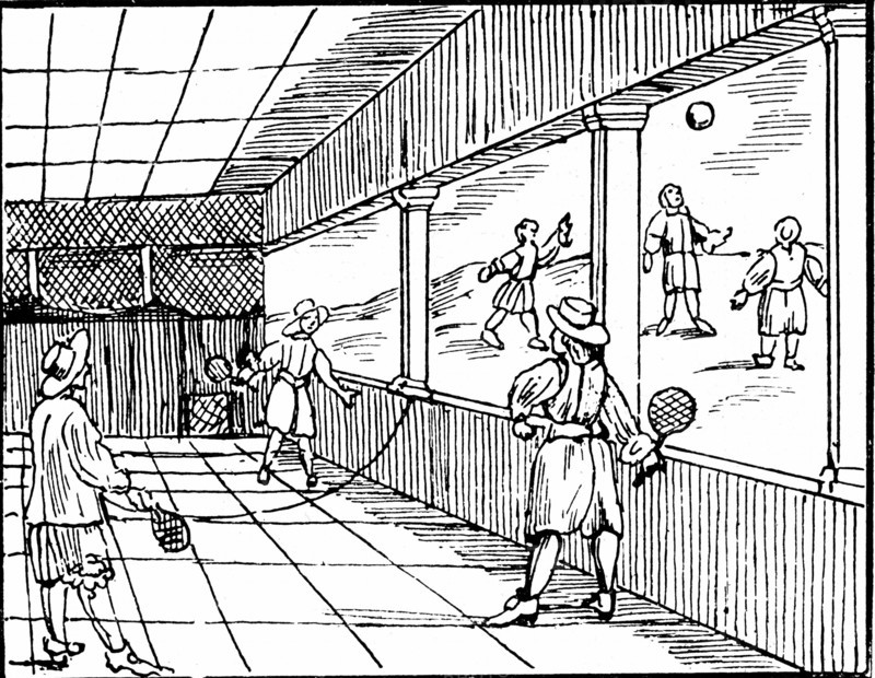 Young men playing a form of tennis