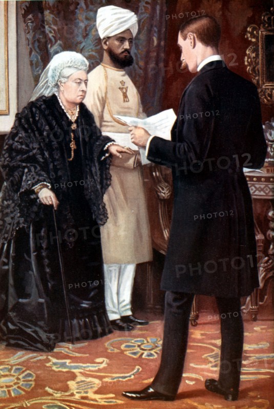 Queen Victoria listening to a dispatch from the front line during the Boer War