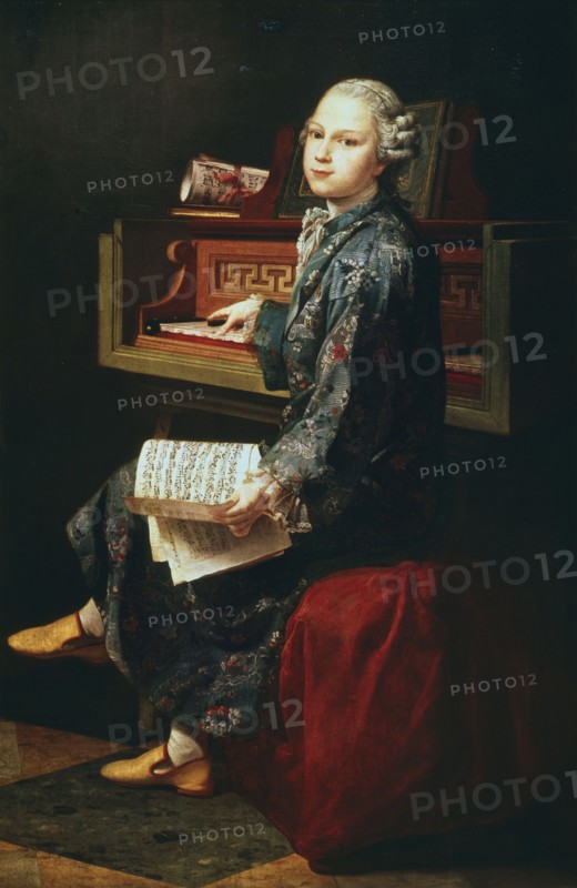 Young musician at the keyboard