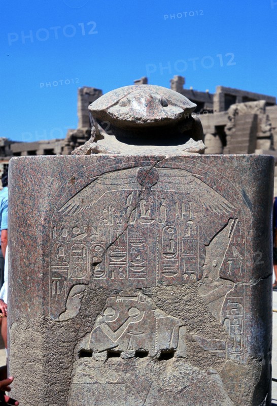 Scarab surmounting relief of a pharoah receiving tribute
