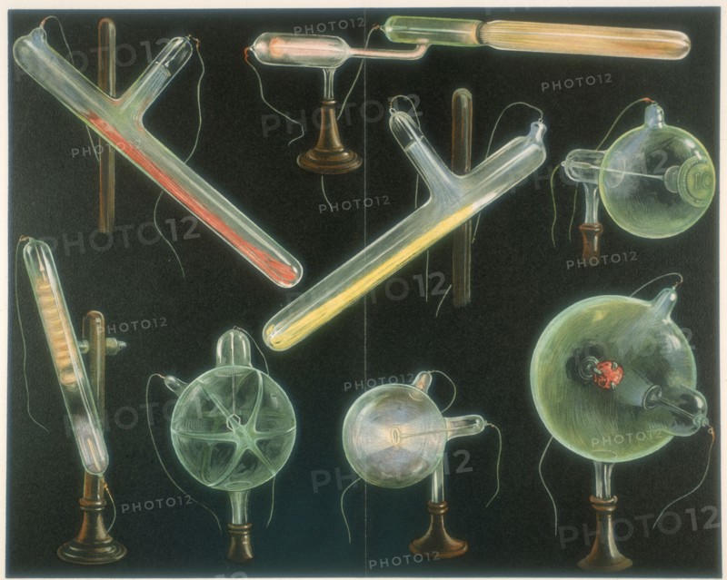 Various substances fluorescing in vacuum tubes of different shapes