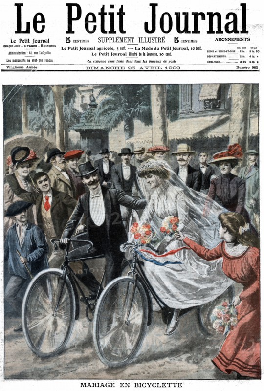 Wedding party on bicycles led by Bride and Bridegroom
