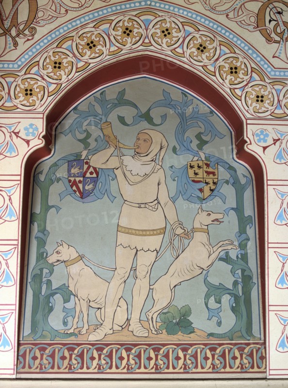 Medieval huntsman eith hunting horn and dogs