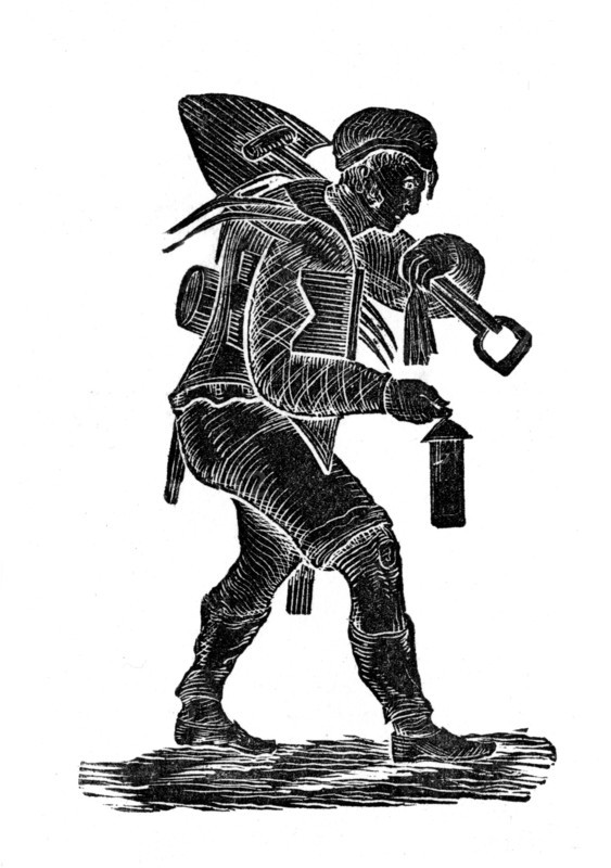 The coal miner carrying his tools and safety his lamp