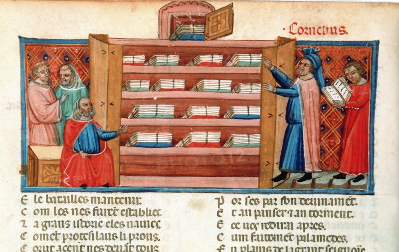 Monks and students in a library
