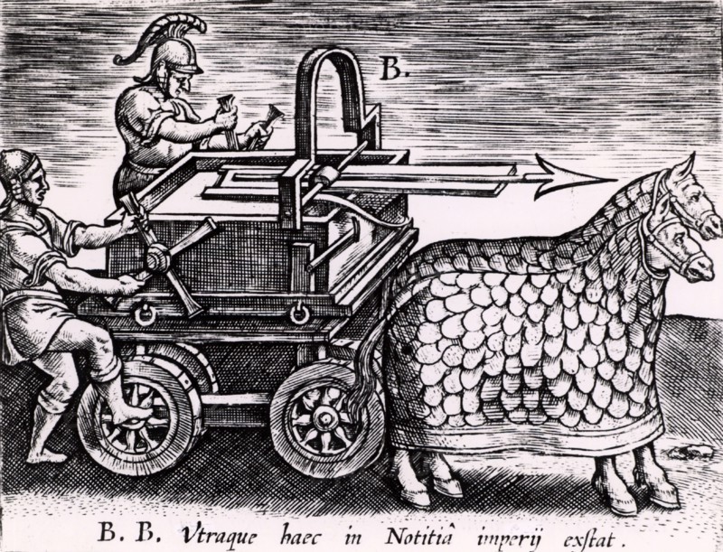 mounted on a carriage drawn by two mailed horses