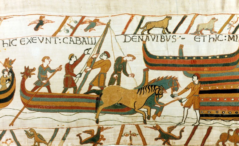 Bayeux Tapestry 1067:  Horses being unloaded from Norman boats at Pevensey, south coast of England, 28 September 1066
