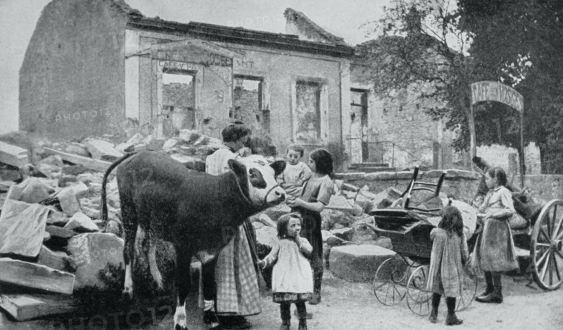 French villagers returning to their devastated village