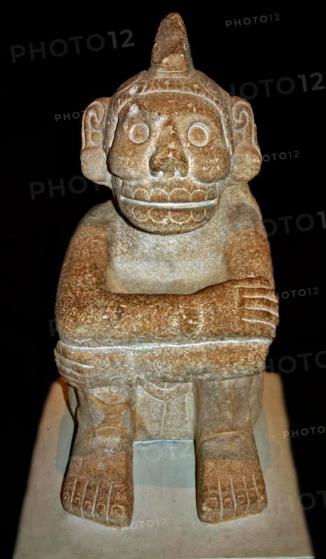 Stone seated figure of Xochipilli