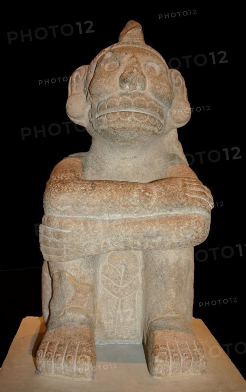 Stone seated figure of Xochipilli