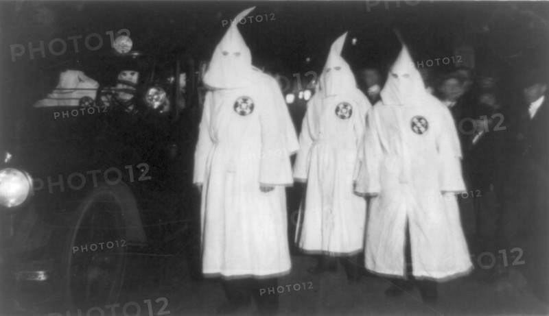 Three Ku Klux Klan members