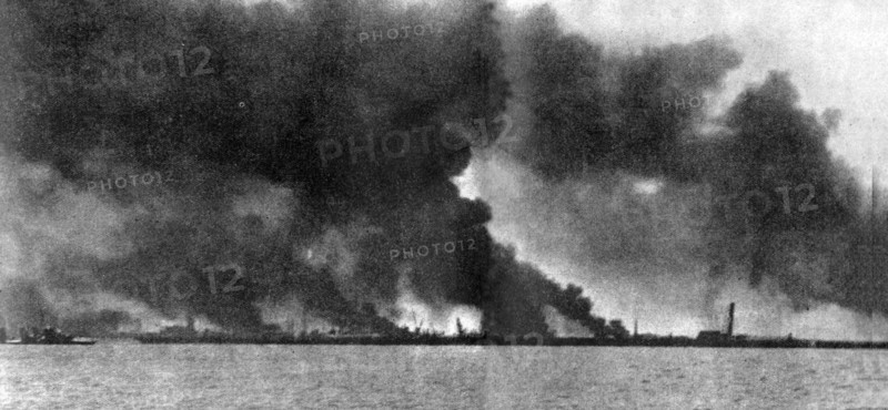 Dunkirk in flames from German bombardment