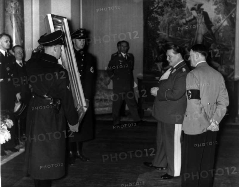 Hermann Göring shows a confiscated painting to Adolf Hitler