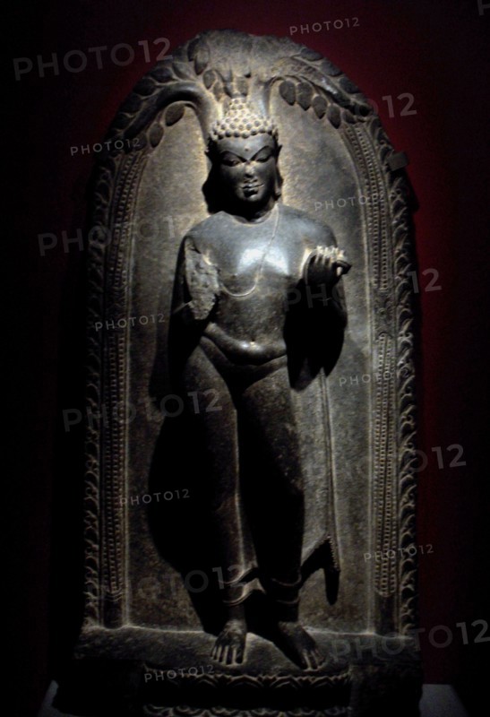 Buddha depicted in a sculpted relief in Stone