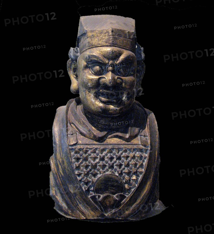 Gilt bronze head of a Buddhist guardian figure