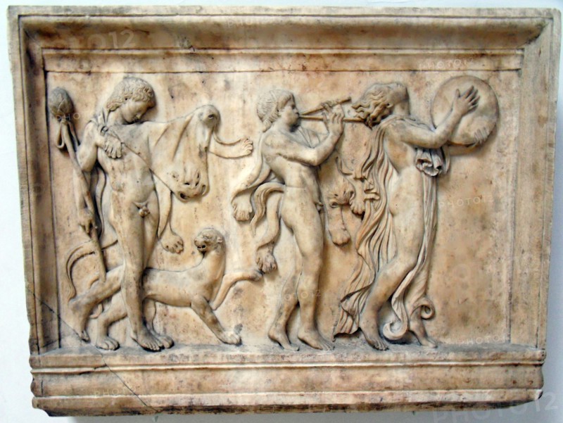 Marble relief of a maenad and two satyrs in a Dionysiac procession
