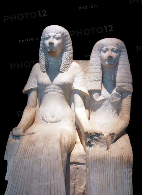 Limestone statue of a husband and wife
