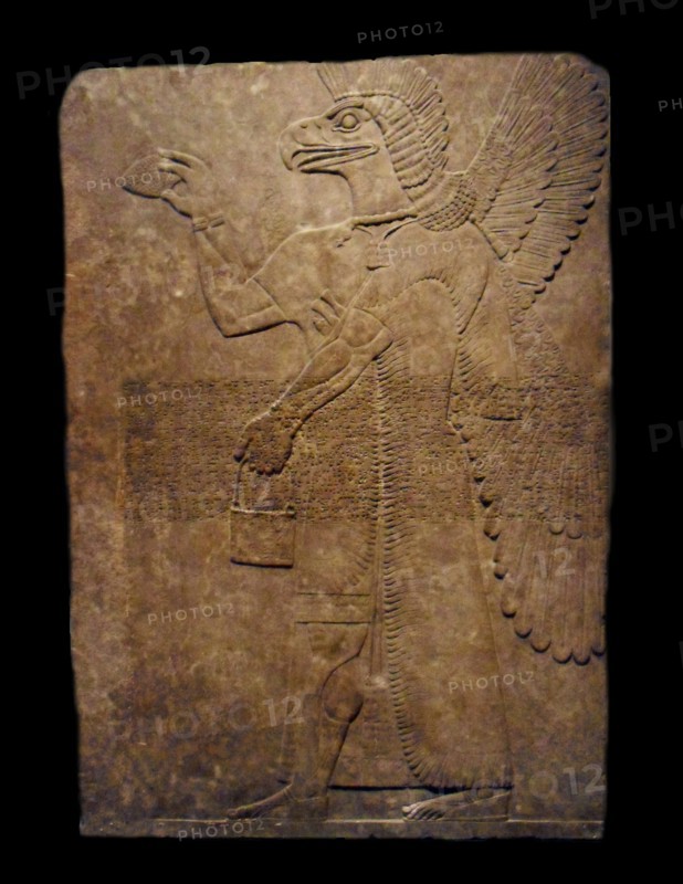 Assyrian winged genie figure