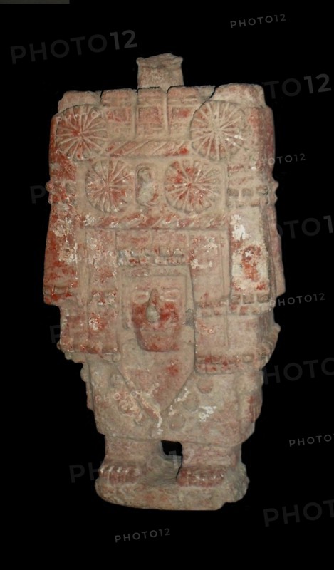 headdress represents a temple or grain store