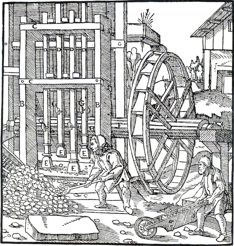 Overshot water wheel turning the cam-shaft of a stamping mill