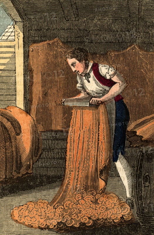 The Currier working at a beam board