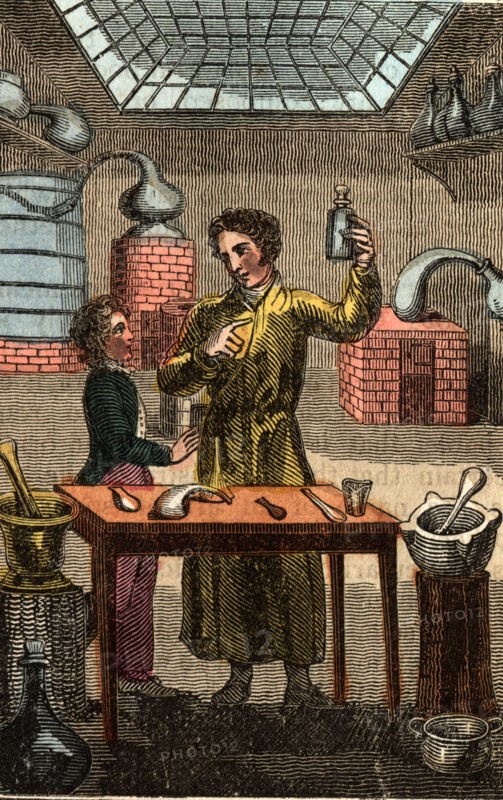 The Chemist instructing his young apprentice