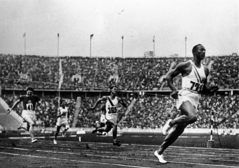 Jesse Owens running at the 1936 Olympics in Berlin.