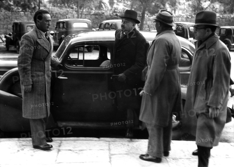 Dr Chair Weisman at the Office of the Royal Commission in his car 1936.