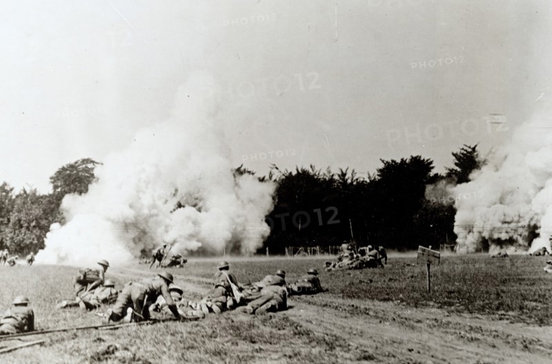 Photograph of the 326th Infantry, 82nd Division, advancing on enemy positions in Choloy, France. 1918