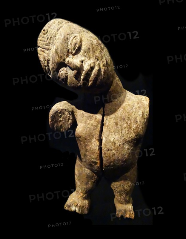 Wood and copper reliquary guardian figurine