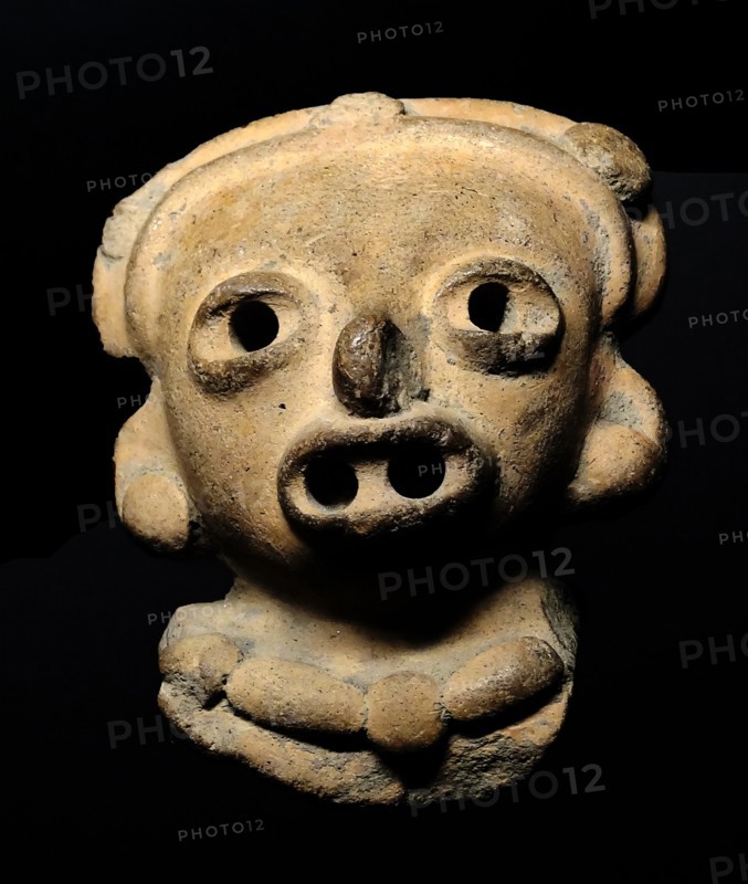 Olmec figurine, made from terracotta. From Mexico or Guatemala. 1500-600 BC
