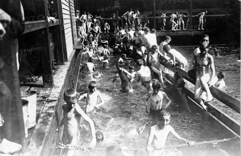 City children in free bath at the Battery, New York City, USA.