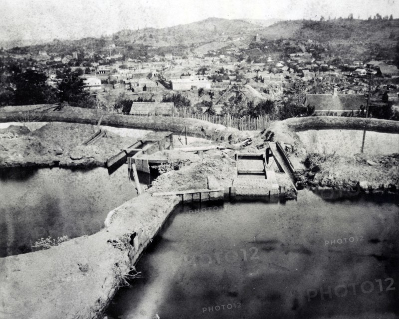 Photograph shows reservoirs used for mining placer gold at Columbia, Tuolumne County, California.