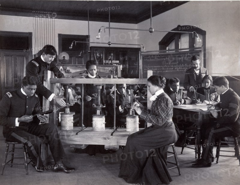 The cheese press screw - students studying agricultural sciences, Hampton Institute, Hampton, Virginia. 1900