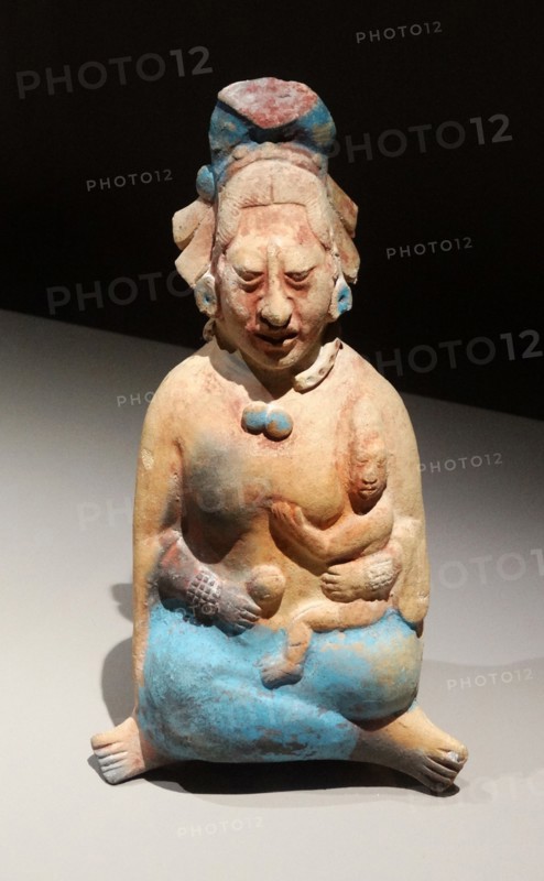 Mayan ceramic figurine of a noblewoman with a small child,